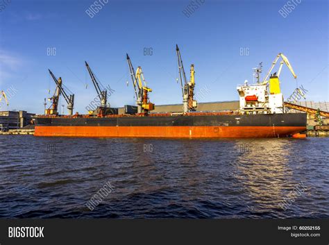 cargo ship unloading image photo  trial bigstock