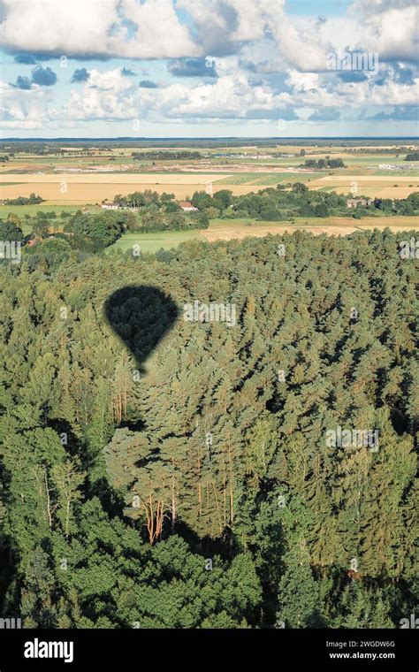 A Trip With A Hot Air Balloon Over The Forests Of Lithuania Balloon Shadow On Green Forest