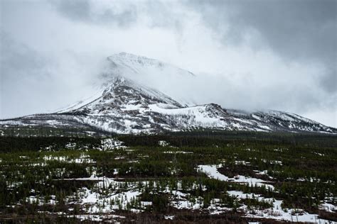 snow covered mountain in Glacier National Park | Smithsonian Photo Contest | Smithsonian Magazine