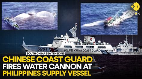 South China Sea Tensions Chinese Coast Guard Fires Water Cannon At