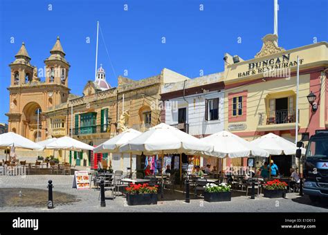 Outdoor restaurants in Marsaxlokk Square, Marsaxlokk, South Eastern ...