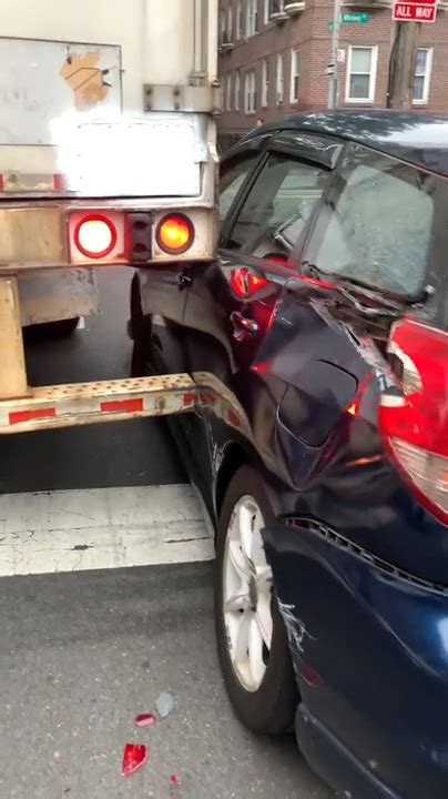 Semi Truck Driver Wrecks Car And Gets Stuck While Trying To Turn In