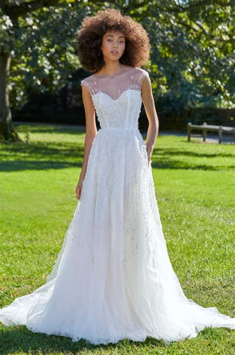 Cap Sleeve Beaded A Line Wedding Dress With Illusion Neckline