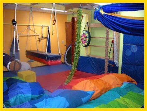 Crash Pads And Swings Fun Sensory Rooms Sensory Room Therapy Room