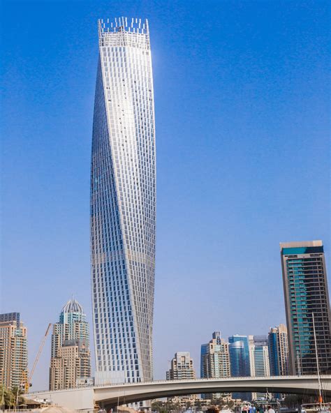 Cayan Tower Architecture Roofer Sits On Concrete Cross Beam Of Cayan