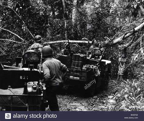 Mercenaries Removing Road Block In Congo Jungle