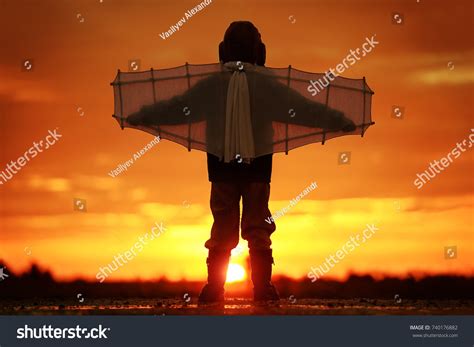 Boy Wings Sunset Imagines Himself Pilot Stock Photo 740176882