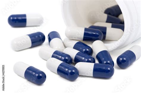 Blue And White Capsule Pills Buy This Stock Photo And Explore Similar