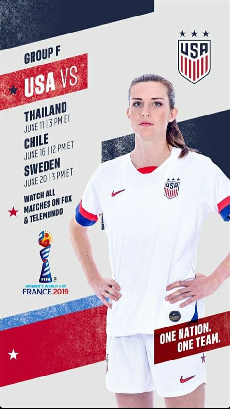 A Female Soccer Player Is Standing In Front Of An Official Poster For