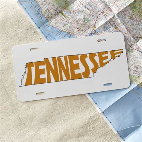 Tennessee State Name Word Art orange License Plate | Zazzle.com