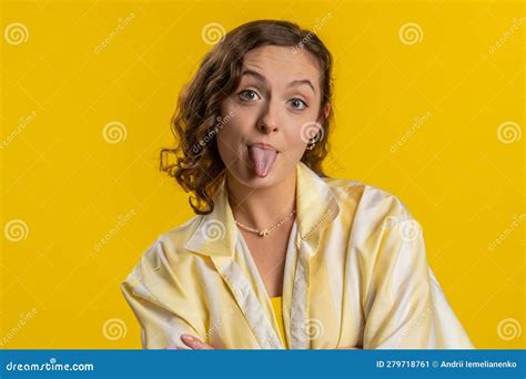 Cheerful Funny Bully Young Woman Showing Tongue Making Silly Faces