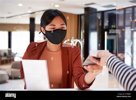 Young Female Hotel Receptionist Hi Res Stock Photography And Images Alamy