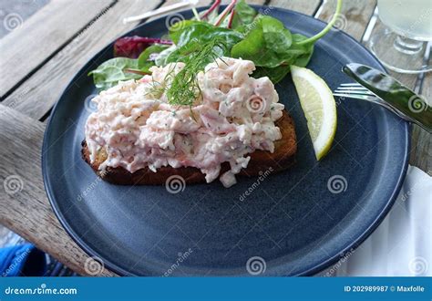 Toasted And Buttered Hot Cross Bun Royalty Free Stock Photo