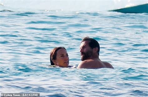 Bikini Clad Mel C 50 Shares A Steamy Kiss With Model Boyfriend Chris Dingwall And Shows Off