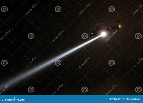 Police Helicopter with Searchlight at Night Stock Image - Image of ...