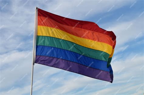 Premium Photo Colorful Rainbow Gay Pride Flag Against The Blue Sky