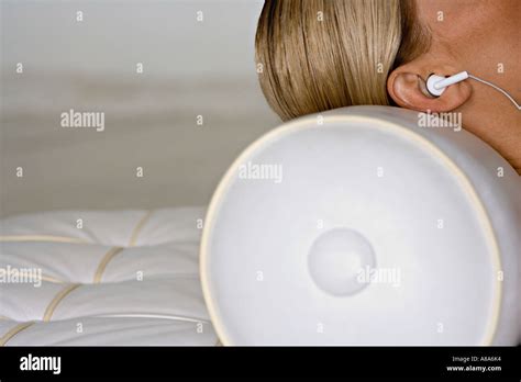 woman wearing headphones stock photo alamy