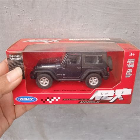 Jual Welly Nex Skala 32 36 Jeep Wrangler Rubicon Hitam Shopee Indonesia