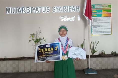 Putri Prajurit Yonif 5 Marinir Raih Prestasi Pada Olimpiade Bahasa