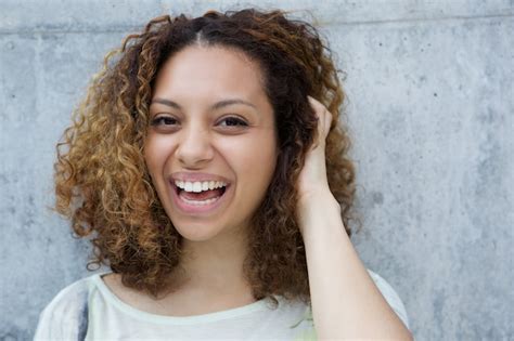 Premium Photo Cheerful Young Woman Laughing