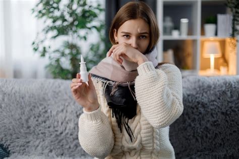 Premium Photo Woman Using Nasal Spray