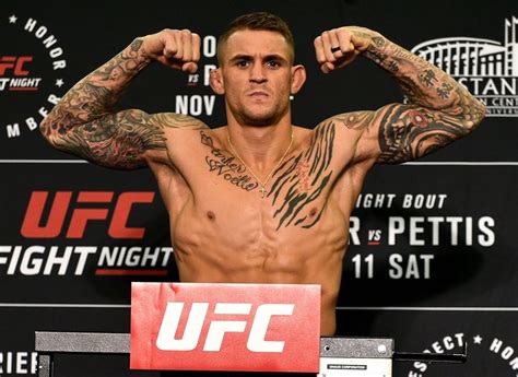 Norfolk Va November 10 Dustin Poirier Poses On The Scale During The