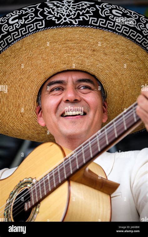 Live Music Male Mexican Mariachi Acoustic Guitar Player Wearing A