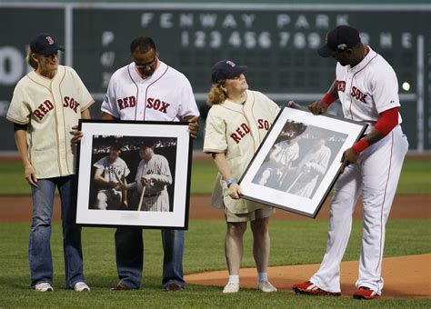 Claudia Daughter Of Legendary Red Sox Player Ted Williams Is Handed A Picture Of Her Father