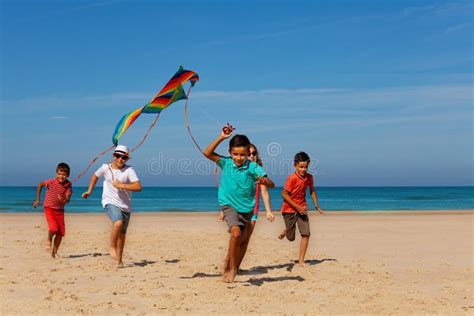 Group of Kid Children with Color Kite on a Beach Stock Image - Image of ...