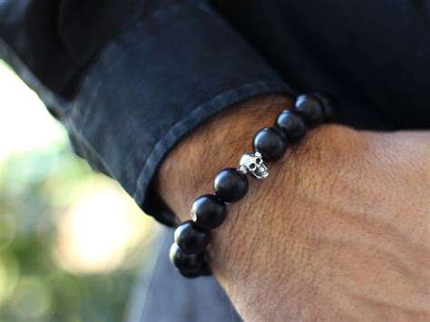 Pulsera de hombre con madera de ébano y calavera en plata de ley