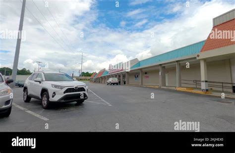 Urban retail strip mall shopping center parking lot exterior Stock ...