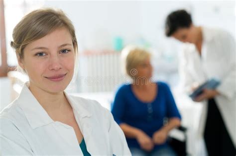 Smiling Blonde Haired Doctor Standing In Office Stock Image Image Of Portrait Colleague
