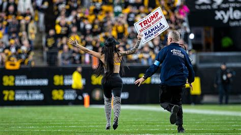 Woman Runs Onto Steelers Field With Pro Trump Sign As Former President