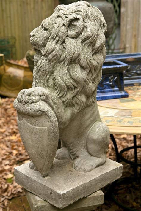 Pair Seated Cast Concrete Lions With Shields For Sale At Stdibs