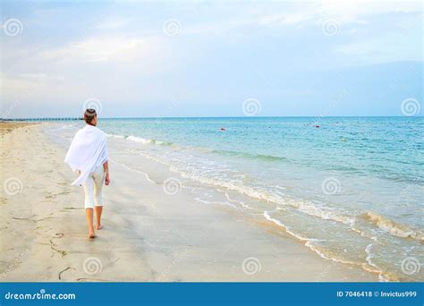 Beach Walk Along A Shore Stock Photo Image Of Blue Adult 7046418