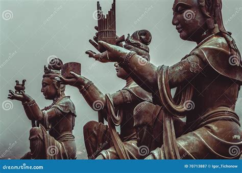 Buddhist Statues Praising And Making Offerings To Buddha Stock Image