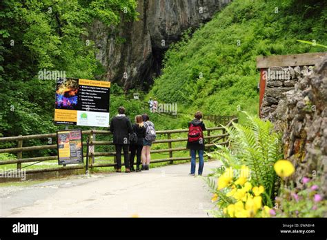 Walkers Approach The Entrance To Peak Cavern A Showcave At Castleton