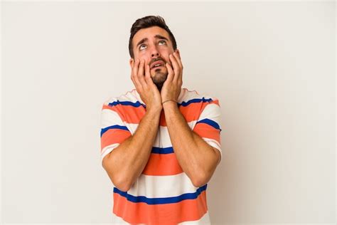 Premium Photo Young Caucasian Man Isolated On White Wall Whining And