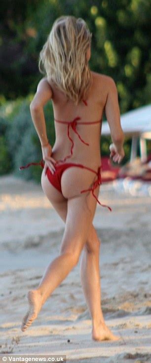 Kimberley Garner Does Her Best Baywatch Impression In Red Bikini In The
