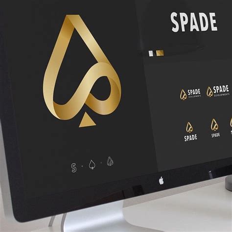 a computer screen with the word spade on it and gold foiled letters in ...