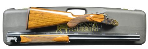 Sold at Auction: CAESAR GUERINI WOODLANDER SHOTGUN.