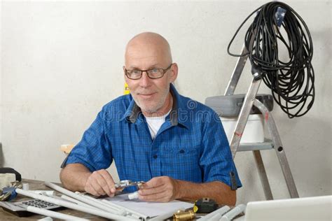 Portrait Of Mature Handyman At Diy Workshop Stock Photo Image Of