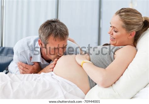 Man Kissing His Wifes Belly Stock Photo Shutterstock