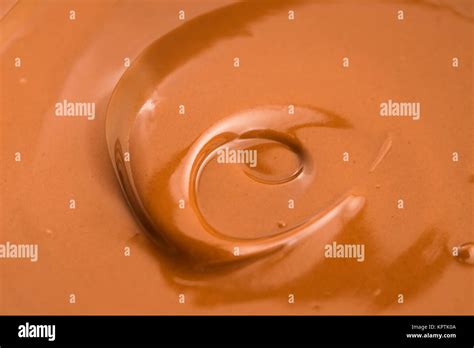 Background Of Melted Milk Chocolate Stock Photo Alamy