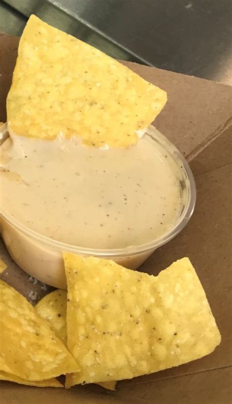 CHIPS QUESO The Naked Empanada