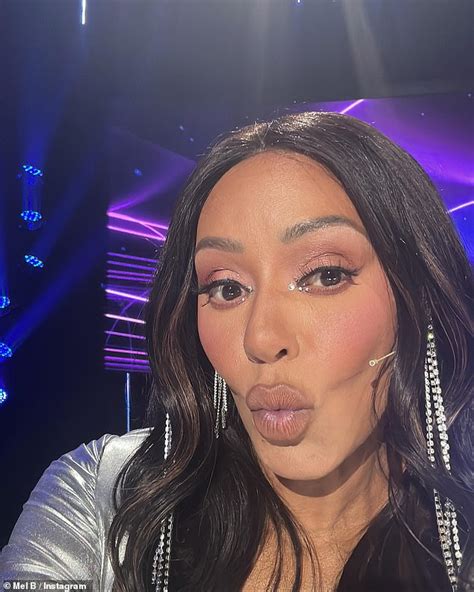 Mel B Looks Fierce In A Busty Metallic Mini Dress As She Poses For