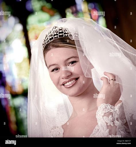 Bride In Church Traditional 1990s White Wedding Bridal Gown Veil And