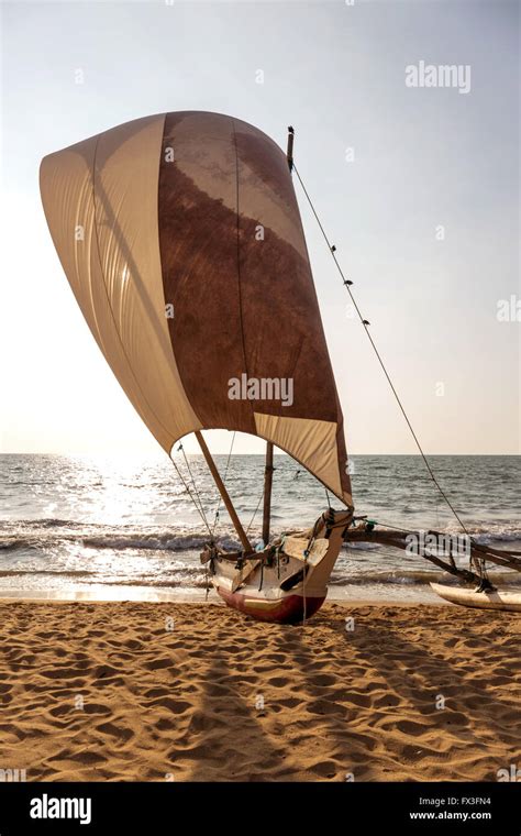 View Of Traditional Outrigger Fishing Boat Oruva With Sail On Negombo