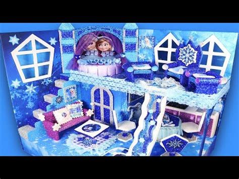 The Doll House Is Decorated In Blue And White Colors With Snowflakes On It