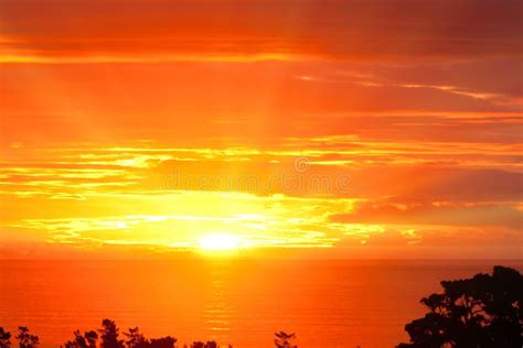 Spectacular Dramatic Orange Sunset Over The Ocean Stock Image Image